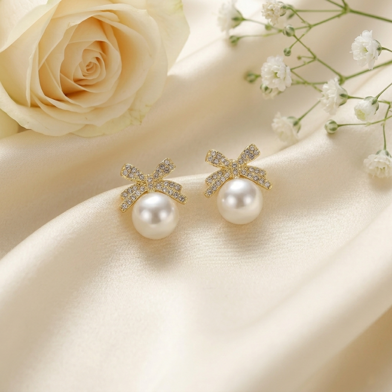 Elegant Bows Meet Timeless Pearls Earrings